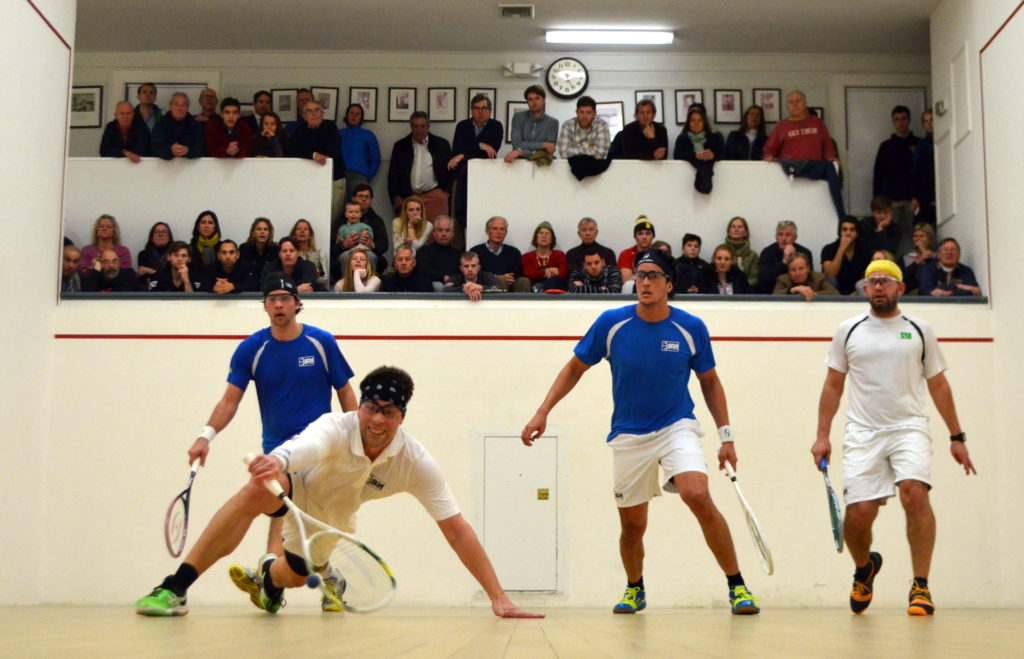 l-r: Greg Park (l) scrambles to save a ball with partner Imran Khan (r) against Manek Mathur (r) & Yvain Badan (l).