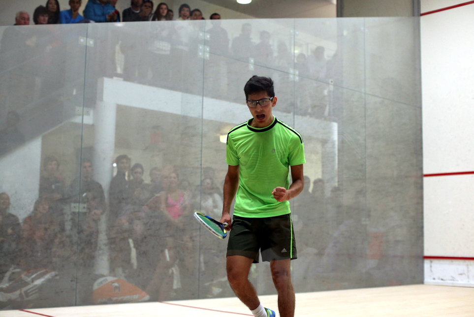 Juan Gomez Dominguez pumps his fist after upsetting the tournament favorite in front of a packed gallery.