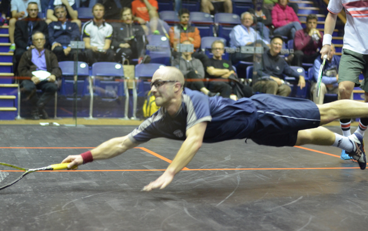 Gilly Lane dives to extent one of many marathon rallies against Julian Illingworth.